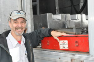 scale technician working on truck scale