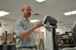 scale technician working on bench scale